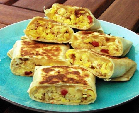 Scrambled Egg Wrap. We had a sandwich like this on vacation with avocado - which I will add if I make this. Scrambled Egg Tortilla Wrap, Scrambled Eggs Wrap, Scrambled Egg Wrap, Baked Omelette, Egg Wraps, Egg Wrap, Wrap Recipe, Eggs Breakfast, Scrambled Egg