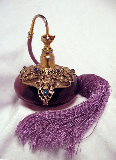 Jeweled Empire Art Antique Perfume Bottle Atomizer. Super rare signed bottle. The glass is Czech,hardware & jewelwork is American. Dates to late 1920's early 30's.Silk cord & tassel. Works beautifully! Antique Objects, Vintage Perfume Bottles Aesthetic, Vintage Fragrance Bottles, Purple Perfume Bottle, Old Perfume Bottles Vintage, Koleksi Parfum, Perfume Container, Old Perfume Bottles, Perfume Bottle