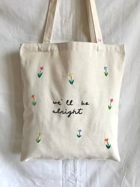 Embroidery tote bag embroidered personalised bags cool tumblr cute pinterest aesthetic ideas for gift flowers fiori ricamo a mano personalizzato borsa di cotone fine fine harry styles we’ll be alright Canvas Bag Ideas Design, Tote Embroidery Ideas, Tote Bag With Embroidery, Embroider Aesthetic, Tote Bags Embroidery Ideas, Diy Canvas Bags, Cute Tote Bags Aesthetic, Canvas Bag Painting Ideas Easy, Tot Bag Broderie