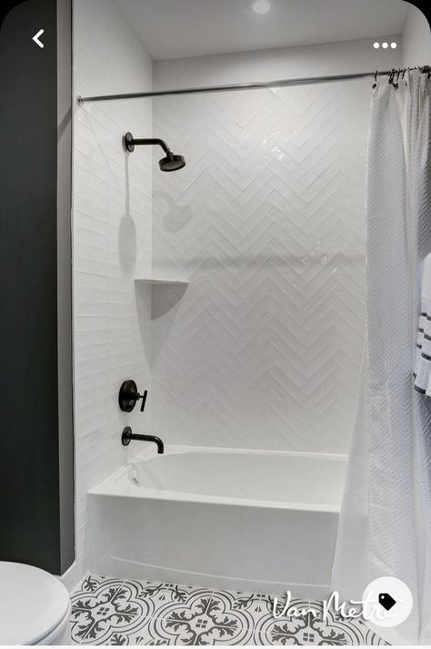 Light Bathroom Shower Tile, White Subway Herringbone Bathroom, Herringbone On One Shower Wall, Herringbone Shower Tile With Tub, Small Bathroom With Tub Tile Ideas, Tiled Bathtub Walls, Bathtub White Tile, Subway Tile Bathroom Herringbone, Accent Tiles Bathroom