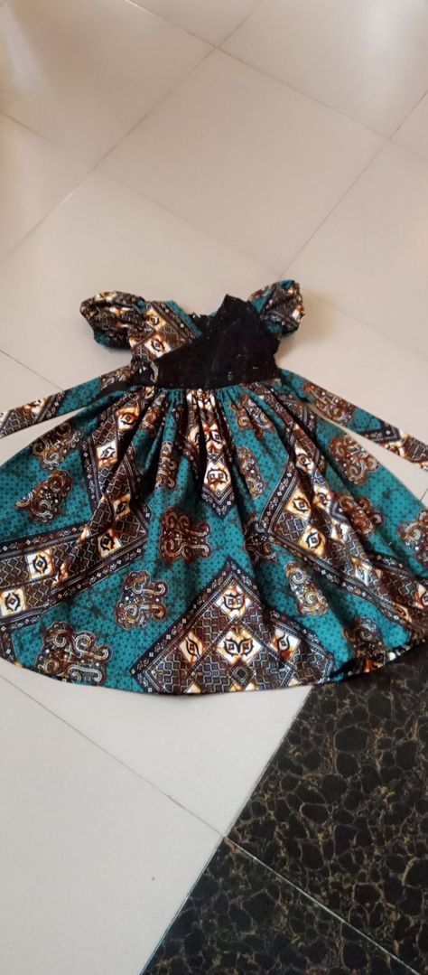 Baby girl ball Ankara gown Baby Ankara Gown, Children Ankara Ball Gown Styles, Ankara Gown For Kids Girl, Ankara Ball Gown For Kids, Ankara Gown For Kids, Children Gowns Dresses Ankara, Latest Children Ankara Gown, Children Ankara Gowns, Ankara Styles For Kids