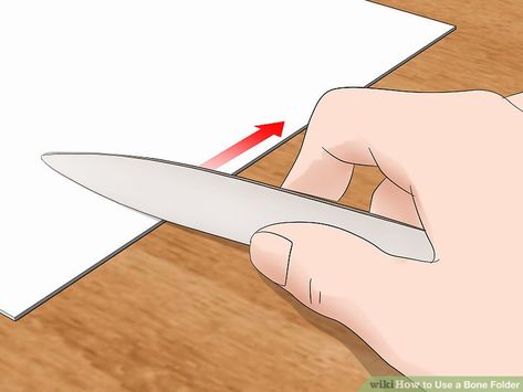 3 Ways to Use a Bone Folder - wikiHow Book Folding Art, Mixed Media Art Techniques, Book Binder, Art Tool, Envelope Art, Bone Folder, Making Greeting Cards, Stationery Store, Book Folding