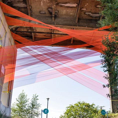 construction netting gets re-contextualized in city fabric installation Textile Art Installation, City Fabric, Net Architecture, String Installation, Fabric Installation, Artistic Installation, Art Installation, Light Installation, Land Art