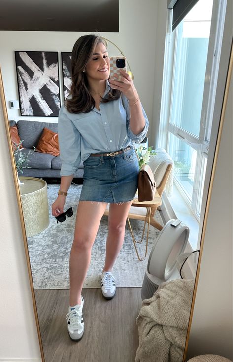 Woman mirror selfie wearing a blue button down shirt, denim mini skirt and adidas samba og. Summer outfits 2023, outfit inspo, outfit ideas, summer trends Adidas Samba With Skirt, Denim Shoes Outfit Fashion Ideas, Samba Addidas Outfits, Sambas Adidas Women Outfit Skirt, Adidas Sambas Outfits Women Summer, Adidas Samba Og Women Outfit, Samba Skirt Outfit, Mini Skirt Denim Outfit, Sambas Adidas Women Outfit Summer