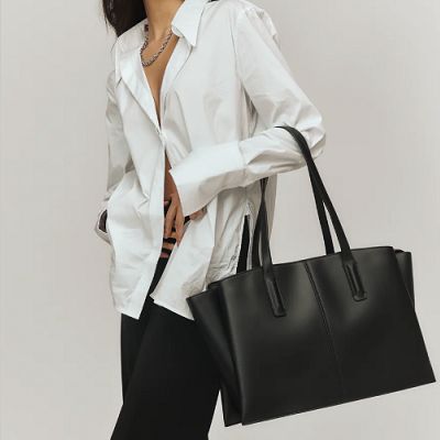 This laptop tote looks like a winner, especially if you carry a 16" laptop. The post Coffee Break: Paloma Laptop Tote appeared first on Corporette.com. Laptop Tote, Black Luxury, Vegan Leather Bag, Work Bag, Work Bags, Leather Zipper, Coffee Break, Popular Style, Stylish Accessories