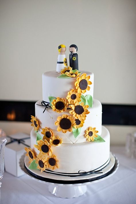 Sunflower wedding cake - I love that the cake topper groom even has a sunflower boutonniere!  Photography by brittanysweat.com Sweat Photography, Sunflower Wedding Cake Topper, Small Sunflower Wedding Cake, Sunflowers On Cake, Simple Wedding Cake With Sunflowers, Yellow Flower Wedding Cake, Savannah Elopement, Sunflower Weddings, Sunflower Boutonniere