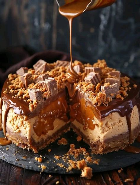 I love food 🤤 | Butterfinger Caramel Crunch Cheesecake 😊  | Facebook Caramel Toffee Crunch Cheesecake, Crazy Desserts, Crunch Cheesecake, Cheesecake Ingredients, Butterfinger Candy, Caramel Crunch, Cracker Crust, Delicious Cake Recipes, Easy Baking Recipes Desserts