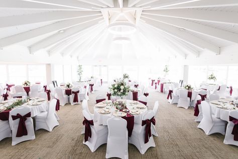 Burgundy wedding decor, chair covers with burgundy sash, low and tall bouquets, Fall wedding decor, burgundy table runners, elegant country club wedding Wedding Decor Burgundy, Burgundy Wedding Decor, Burgundy Table Runner, Burgundy Decor, White Chair Covers, Fall Wedding Decor, Chair Bows, Gold Napkins, Secret Wedding