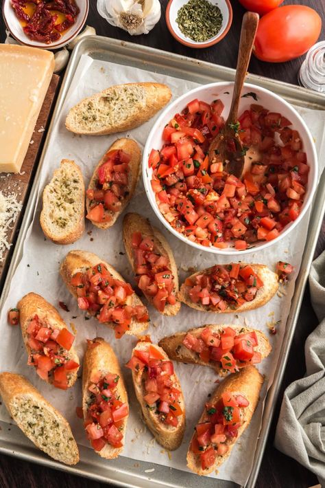 A medley of fresh basil, garlic, and a homemade balsamic vinaigrette grace the top of crusty bread slices in this bruschetta recipe. A timeless appetizer for all occasions! Zucchini Bruschetta Recipe, Bruschetta Aesthetic, How To Make Bruschetta, Easy Bruschetta Recipe, Homemade Bruschetta, Homemade Balsamic Vinaigrette, Easy Bruschetta, Popular Appetizers, Bruschetta Recipe