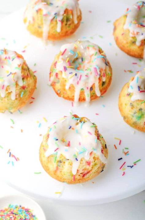 These homemade Funfetti Mini Bundt Cakes are perfect for any celebration! Made with simple ingredients and lots of sprinkles! | The Bitter Side of Sweet Mini Bundt Cakes From Cake Mix Boxes Funfetti, Funfetti Mini Bundt Cake, Recipes For Mini Bundt Cake Maker, Homemade Mini Bundt Cakes, Mini Cake Mold Recipes, Easy Mini Bundt Cakes, Easter Mini Bundt Cake Ideas, Mini Bundt Maker Recipes, Mini Vanilla Bundt Cakes