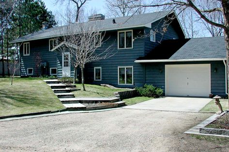 Before: Generic Two-Story Home Exterior Home Makeover, Raised Ranch, Ranch House Exterior, Garage Door Styles, Before And After Home, Exterior House Remodel, Shingle Siding, Home Exterior Makeover, Exterior Renovation