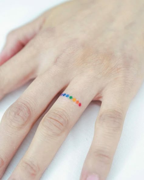 101 Best Minimalist Rainbow Tattoo Ideas That Will Blow Your Mind! - Outsons Rainbow Tattoos Pride, Minimalist Rainbow Tattoo, Rainbow Tattoo Ideas, Rainbow Heart Tattoo, Love Finger Tattoo, Rainbow Tattoo, Minimalist Rainbow, Pride Tattoo, Small Heart Tattoos