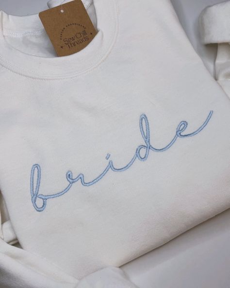 Bride Embroidered Crewneck Sweatshirt 👰‍♀️🩵🦋✨ Looking for the perfect bridal shower gift? Snag one of these cozy crews for the Bride To Be! ✨ Now available to shop online! ▶️▶️ Customization available to add on sleeve embroidery with a wedding date or initials! - #embroidery #shoplocal #hollister #daydream #country #western #smallbusiness #diy #sanbenitocounty #embroiderersofinstagram #cowgirl #rodeo #rodeofashion #westernstyle #westernfashion #embroiderybusiness #bridalshower #bride #... Initials Embroidery, Perfect Bridal Shower Gift, Bride Sweatshirt, Sleeve Embroidery, Cowgirl Rodeo, Rodeo Fashion, Embroidered Crewneck, Wedding Vibes, Bridal Shower Gift