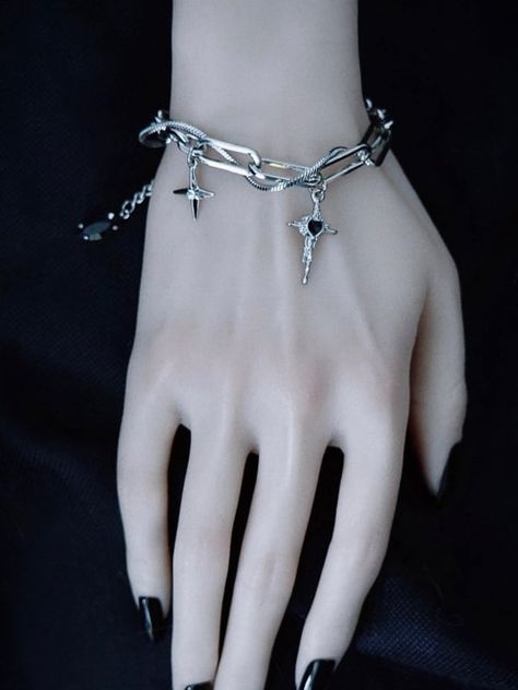 Elevate your accessory game with this unique handcrafted cross charm Gothic bracelet. Embracing the Y2K subculture aesthetic, this silver bracelet exudes a cool and edgy vibe.   Please note that this product includes only one bracelet. Bracelet Ideas Y2k, Y2k Bracelets, Edgy Bracelets, Dream Accessories, Red Gothic, Gothic Bracelet, Edgy Jewelry, Gothic Cross, Gothic Crosses