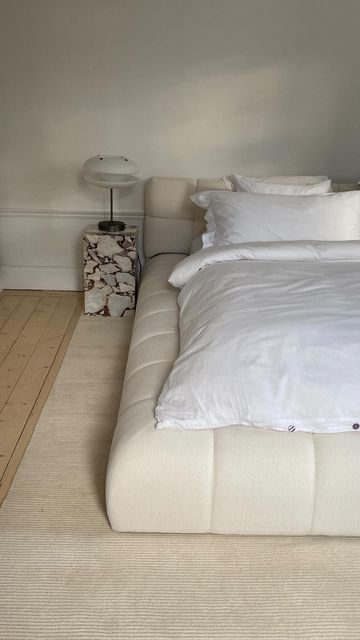 Bed Aesthetic Minimalist, Low Down Bed, Cloudy Bed Frame, White Rug Under Bed, Minimalist Rug Bedroom, Rug For Under Bed, Double Rug Bedroom, Corner Bed Rug, Bedroom Rug Aesthetic