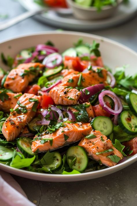 Indulge in the perfect balance of flavors with these delicious salmon salad recipes. Whether you're looking for a light and refreshing meal or a nutritious dish packed with omega-3s, there's a salmon salad recipe here to suit your taste. From bright citrus dressings to crunchy veggies and creamy avocado, these healthy salads are not only easy to make but also incredibly satisfying. Try out one of these salmon salad recipes today for a lunch or dinner option that's both tasty and good for you! Tasty Salads Healthy, Easy Diet Salad Recipes, Salmon On Salad, Salmon And Arugula Salad, Easy Salmon Salad, Salad Recipes With Salmon, Refreshing Salads Summer, Salmon Ceased Salad, Salmon And Salad Recipes