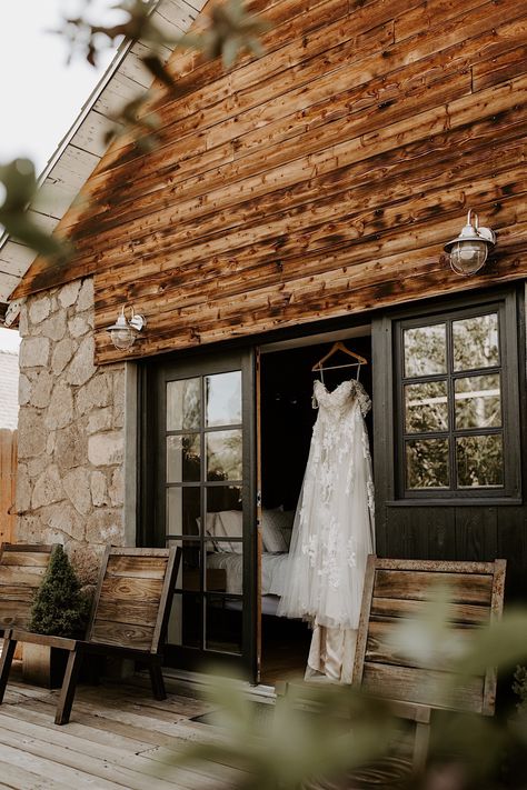 Cabin airbnb wedding dress inspiration lace wedding dress arizona wedding photographer flagstaff wedding dress hanging photos Hanging Wedding Dress, Cabin Airbnb, Blue Green Wedding, Airbnb Wedding, Honeymoon Photos, Cabin Wedding, Outdoor Elopement, Winter Wedding Flowers, Bridal Pictures