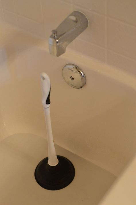 Before resorting to Draino, try using a plunger to unclog the bath tub drain! Unclog Tub Drain, Unclogging Bathtub, Clogged Sink Bathroom, Unclog Bathtub Drain, Clogged Drain Bathtub, Toilet Drain, Cottagecore Kitchen, Clogged Toilet, Unclog Drain