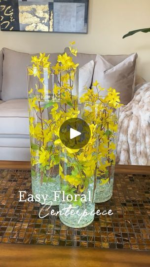 2.3K views · 189 reactions | 💛Simple DIY Floral Centerpiece💛

Let’s bring back the beautiful DIY cylinder centerpieces! 

To recreate you need⬇️
✨Glass Pebbles @dollartree 
✨Florals @michaelsstores 
✨Cylinder Vases @athomestores 

How to create water floral arrangement| Water floral design idea| Flower arrangement| Floral hack| Water floral arrangement DIY| Water floral arrangement idea
.
.
.
.
.
#diy #diyhomedecor #diydecor #diylover #diylove #diyideas #instadecor #homedecor #floralarrangement #centerpiece #centerpieceideas #centerpieces #floral | Alexandra Volcy | Meghan Trainor · To The Moon Cylinder Vase Centerpiece, Cylinder Centerpieces, Diy Floral Centerpieces, Vase Centerpiece, Centerpieces Floral, Glass Pebbles, Arrangement Floral, Floral Arrangements Diy, Diy Water