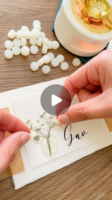 Pressed Flowers For Wedding Decor & Crafts | Cards & Frames on Instagram: "Wax seal place cards🎀🕊️

DM or visit link in bio for details😉
.
.
.
#pressedflowers#pressedflowerart#gypsophila#babysbreath#classic#weddingwaxseal#weddinginspiration #weddingideas#placecards#weddinginspo #weddingdiy#bridetobe#bride2024#ukbride#craftideas#diy#diyideas#weddingdecor#partyideas#babyshowerdecorations#bridalshowerdecor#bridalshowerideas#waxseal#waxsealing#waxseals#cricut" Wedding Place Card Ideas Diy, Diy Wax Stamp, Wax Seal Place Cards, Flowers For Wedding, Diy Wax, Crafts Cards, Wax Stamp, Wedding Place, Wedding Place Cards