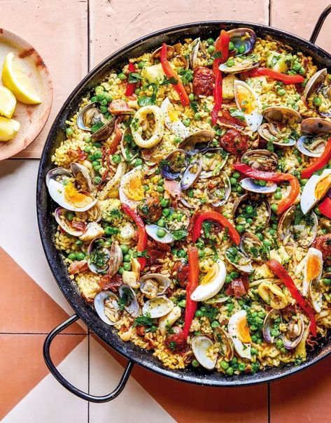 Experience Sevilla-Style Paella: saffron rice, fresh seafood, and chorizo. Perfect for any occasion, it brings Seville to your table. @rylandpetersandsmall @FireflyBooksLtd #mariajosesevilla #cocinadeandalucia #paellasevilla #paella Best Paella Recipe, Spanish Paella Recipe, Easy Paella, Spanish Saffron, Paella Recipe Seafood, Brunch Burger, Paella Valenciana, Mouthwatering Food, Paella Pan