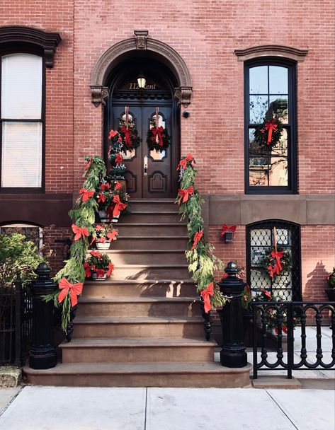 Stoop decoration season in full force! #nyc #brooklyn #brownstone #christmas #decorations #holidaydecor #holiday #winter #newyork #wreaths Brownstone Christmas Decor Outdoor, Brownstone Christmas Decor, Christmas Stoop Decor, Front Steps Christmas Decor, Brownstone Christmas, Stoop Decor, Porch Christmas Decorations, Outdoor Christmas Decorations Lights, Joy Decorations