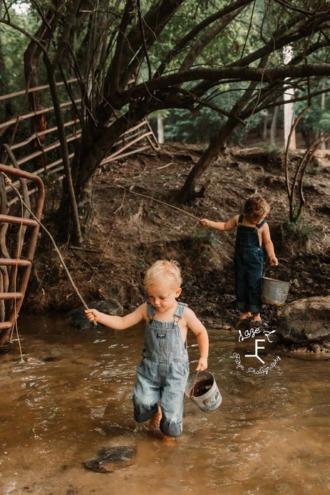 little brother crossing the creek with big brother at the shore Creek Pictures Kids, Creek Photoshoot Kids, Kids Playing Outside, Creek Family Photoshoot, Toddler Photos, Water Pictures, Kids Fishing, Fishing Pictures, Farm Photography