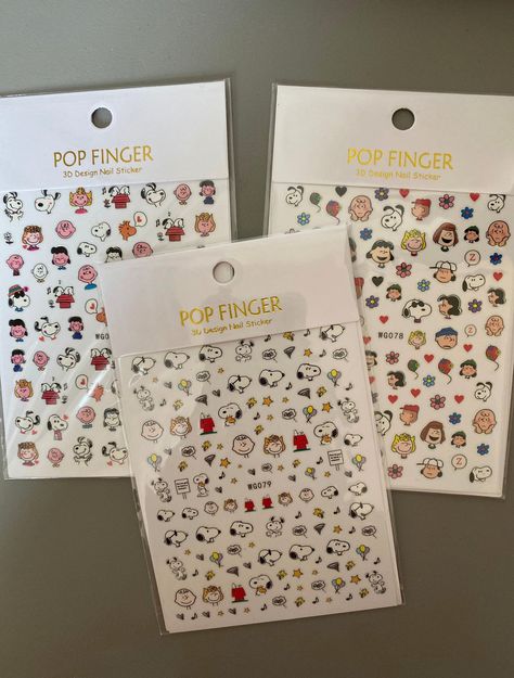 This set includes one nail sticker, available in six unique styles: WG080 Happy Face, WG078 Heart & Flower, WG082 Mixed, WG079 Star & Music, WG083 Snoopy Big House, and Hanyi 093 Love. If no specific style is requested, a random selection will be shipped. Snoopy Stickers, Snoopy Nails, Sticker Nails, Snoopy Items, Snoopy Stuff, Nails Stickers, Gifts For Best Friends, Stickers Collection, Snoopy Wallpaper