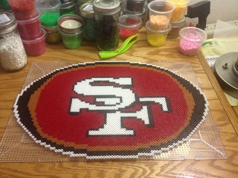 49ers bead creation 49ers Perler Bead Patterns, Perler Pattern, Nfl Logos, Disney Room, Stitch Stuff, Bead Creations, Stitch Earrings, Graph Paper Drawings, Hamma Beads