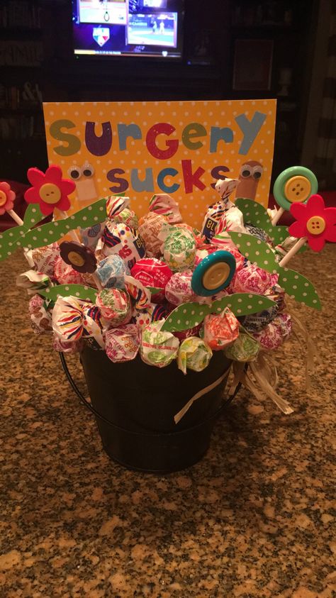 Surgery sucks!! Get well soon bucket Get Well Soon Basket, Post Surgery Gift, Get Well Baskets, Halloween Care Packages, Surgery Gift, Easy Does It, Cheer Up Gifts, Hospital Gifts, Get Well Soon Gifts