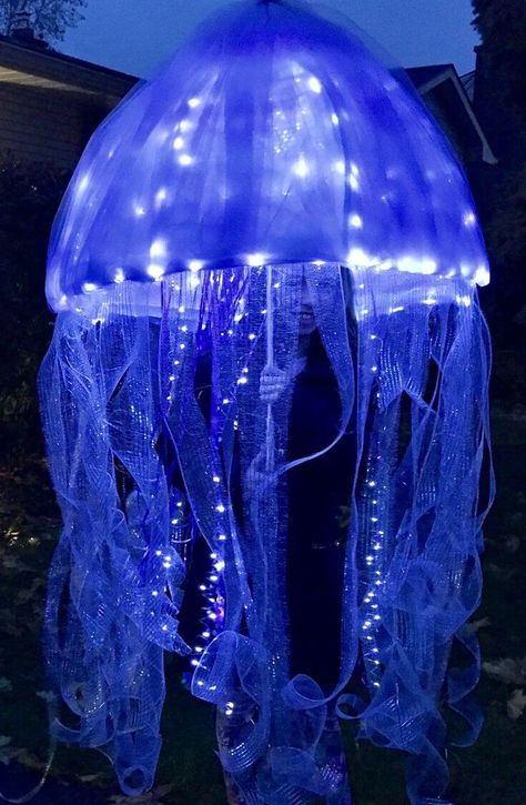 DIY Jellyfish Umbrella Costumes: Craft Aesthetic & Design Inspiration Water Costume Ideas, Jellyfish Costume Umbrella, Jellyfish Costumes, Jellyfish Outfit, Jellyfish Costume Diy, Jellyfish Umbrella, Jellyfish Halloween Costume, Umbrella Jellyfish, Umbrella Aesthetic