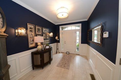 Deep blue walls contrast beautifully with white wainscoting and light floors. Newly built townhomes in Walden Square by County Builders, Inc. Newtown, PA. White Wainscoting Blue Walls, Dark Blue Wainscoting, Hallway Wainscotting, Blue Wainscoting, Entryway Wainscoting, Modern Wainscoting Ideas, Rustic Wainscoting, Deep Blue Walls, Blue Dining Room Walls