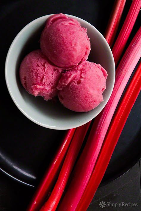 Rhubarb Sorbet ~ Welcome spring with fresh and fruity rhubarb sorbet, made with vibrant pink rhubarb stalks, orange zest, and fresh ginger. ~ SimplyRecipes.com Rhubarb Sorbet, Granitas, Dessert Thermomix, Sorbet Recipe, Sorbet Recipes, Rhubarb Recipes, Ice Cream Popsicles, Köstliche Desserts, Freezer Friendly