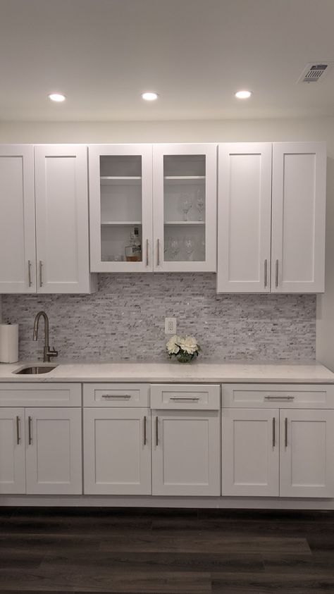 Basement Wet Bar White Cabinets, White Cabinet Wet Bar Ideas, White Wet Bar Basement, White Cabinets Basement Bar, White Cabinet Basement Bar, White Basement Kitchenette, Basement Bar With White Cabinets, Basement Bar Ideas White Cabinets, White Cabinet Wet Bar