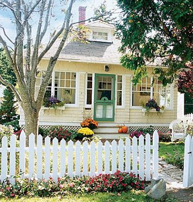 The Cottage Nest: Cottage Dreams Yellow House Exterior, Picket Fencing, Exterior House Colors With Brown Roof, Picket Fences, Farmhouse Architecture, Brown Roof, Yellow Cottage, Pintura Exterior, Yellow House