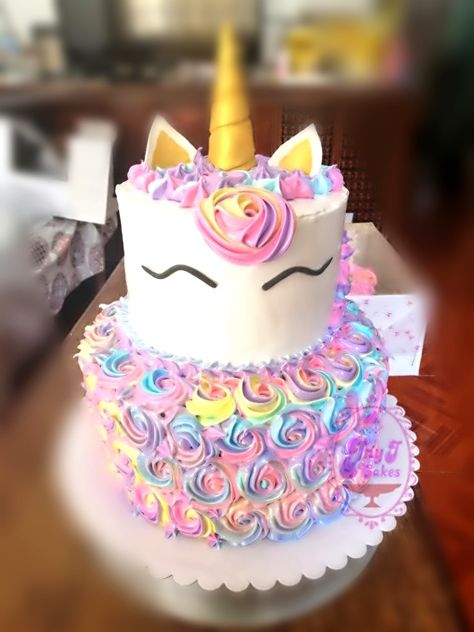 Unicorn cake 2 tier rainbow rosettes May 2020 Unicorn Tiered Cake, Unicorn Rosette Cake, Large Unicorn Cake, Unicorn Tier Cake, 2 Tier Unicorn Cake Design, Two Tier Unicorn Birthday Cake, Unicorn Cake Two Tier, Unicorn Cake 2 Tier, Rainbow Rosette Cake