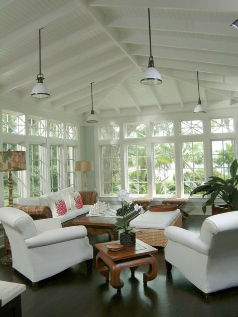 Sunroom with dark wood floors, light blue walls and a white exposed beam ceiling Porch Renovation Ideas, Sunroom Lighting, White Sunroom, Rustic Sunroom, Farmhouse Sunroom, Porch Renovation, Luxurious Living Rooms, Sunroom Furniture, 3 Season Room