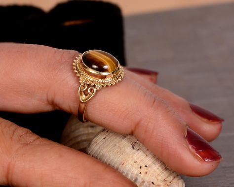 Excited to share the latest addition to my #etsy shop: Dainty Tiger Eye Oval Stone Ring,Gold Tiger Eye Ring, Brown Stone Ring , Healing Tiger eye Ring, Gold Filled Ring, Gold Stacking Ring https://etsy.me/3PX11Wy #women #bohohippie #no #silver #gold #brown #tigerseye # Tigers Eye Ring Gold, Tigers Eye Engagement Ring, Motivational Clothing, Tigers Eye Ring, Gold Ring Stacking, Tiger Eye Ring, Gold Tiger, Gold Tiger Eye, Brass Rings