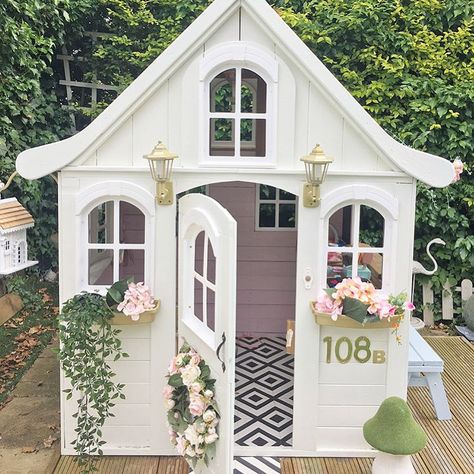 CafeMom.com : A Charming Garden Home : 17 Unique Costco Playhouse Hacks That Are the Ultimate DIY Transformations -- This is the pretty pink palace of our dreams -- complete with its own address! Costco Playhouse, Gingerbread Playhouse, Playhouse Remodel, Playhouse Design, Playhouse Makeover, Childrens Playhouse, Playhouse Plans, Diy Playhouse, Backyard Playhouse