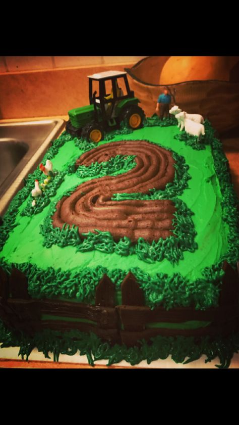 Tractor/ farm chocolate layer cake with buttercream frosting for second birthday Chocolate Farm Cake, Chocolate Tractor Cake, Tractor Themed Cake, Tractor Birthday Cake For Boys, Farm Cakes For Boys, Tractor Birthday Party Cake, Easy Tractor Cake, Farm Cake Ideas, Tractor Birthday Cake