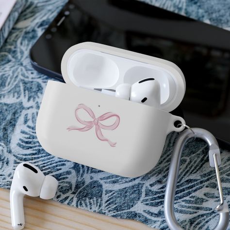 airpods pro 2 case, this AirPods case cover makes the perfect gift for your music-loving loved ones. find your cute coquette AirPods Pro case cover here... This custom AirPods cover safeguards your AirPods/AirPods Pro against bumps, scratches, and drops. With each personalized AirPod case you also get a metal carabiner for secure, effortless transportation. Compatible with the regular and wireless charging case for Airpods and AirPods Pro .: Material: Premium Thermoplastic Polyurethane (TPU) .: Great protection from drops and scratches .: Stipple print texture .: Metal carabiner included .: The cover works with both wireless and regular charging ports Airpods Pro Case Luxury, Bow Airpod Case, Air Pods Case Aesthetic, Cute Airpod Pro Cases, Airpods Case Pro, Aesthetic Airpods Case, Cute Airpod Cases, Air Pods Case, Airpods Pro 2 Case