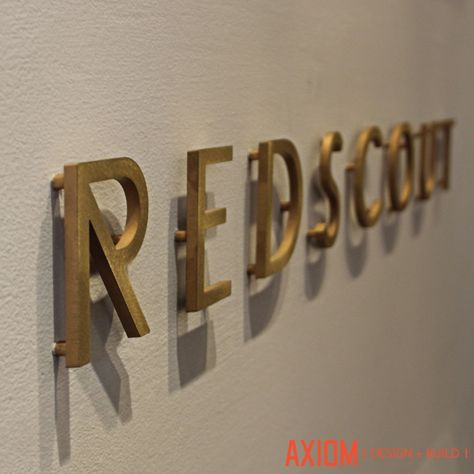 Dimensional Letters and Logos | Signs and Lettering for Office Lobby | Dimensional Signs for Interior and Exterior Use | AXIOM Signs NYC
#signage #DimensionalLetters #Officesigns #TheAXnyc Office Signage Design Exterior, Dimensional Letters Signage, Company Signage Design, Copper Signage, Metal Logo Signage, Office Logo Wall, Interior Signage Design, Logo Wall Design, Brass Signage