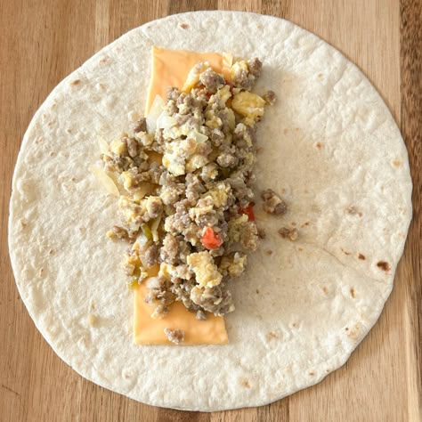 Sausage Burrito, Mcdonalds Breakfast Burritos, Copycat Mcdonalds, Breakfast Wraps Recipes, Frozen Burritos, Sausage Sauce, Eggs And Cheese, Mcdonalds Breakfast, Burrito Recipe