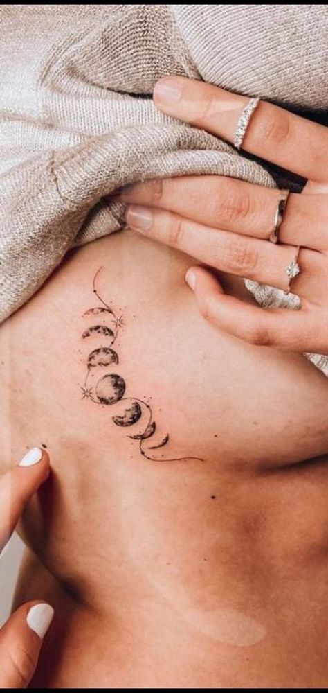 Discover the allure of Moon phase tattoos. We will explore the best designs and insights on choosing the ideal placement. Moon Phase Tattoo With Stars, Moon Phases Tattoo Designs For Women, Moon Tattoo Sternum, Lunar Tattoo, Moon Phase Tattoos, 50 Tattoo, Moon Phases Tattoo, Tattoo Signs, Angel Tattoo Designs