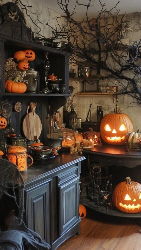 Elevate your kitchen's ambiance with eerily elegant Halloween decor. Drape cobwebs across cabinet handles and arrange vintage-inspired potion labels on glass jars. Display a collection of antique silverware tied with black ribbons. Create a centerpiece using a stack of spell books topped with a crystal ball. Hang a wreath made of miniature skulls and black roses on the pantry door. These sophisticated Halloween kitchen decor ideas transform your cooking space into a stylish witch's den, perfect Pumpkin Painting Ideas Easy, Cute Pumpkin Painting Ideas, Cute Pumpkin Painting, Magical Kitchen, Sophisticated Halloween, Faces Painting, Halloween Window Silhouettes, Creative Halloween Decorations, Pumpkin String Lights