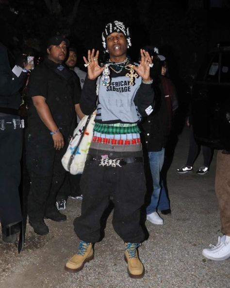 Can you ever wear too many pants? Realistically, yes.👖🩲⁠ ⁠ As far as fashion's concerned, no.⁠ ⁠ Not everyone need be nearly as advanced as A$AP Rocky, though, who simultaneously wore four pairs of boxers and two pairs of pants at Coachella 2024.⁠ ⁠ Start small and stack boxers like Troye Sivan, who presumably learned this feat while modeling for Miu Miu, luxury fashion's undisputed heavyweight champ of underwear as outerwear.⁠ ⁠ Visible underwear has been a thing for a minute but, as of late... Celebrity Coachella Outfits, Asap Rocky Outfits, Rocky Outfits, Best Celebrity Outfits, Pretty Flacko, Kendall Jenner Photos, Rolling Loud, Gala Fashion, Streetwear Inspo