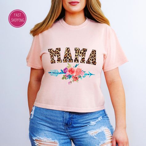 🌸🐆 Looking for the perfect Mother's Day gift? Look no further! 💝 Our Elegant 'Mama' Leopard & Floral Graphic Tee is the perfect combination of style and comfort. 🤩 Gift your mom this trendy leopard print t-shirt for only $21.90! 🎁 Don't miss out on this boxy tee that will make your mom feel like the fierce mama she is. 💪🏼 Shop now and show your mom some love! ❤️ #MothersDay #GiftForMom https://www.etsy.com/listing/1694374770/elegant-mama-leopard-floral-graphic-tee Floral Graphic, Boxy Tee, Your Mom, Mother's Day Gift, Mother’s Day, Feel Like, Mother's Day Gifts, Mother's Day, Graphic Tee