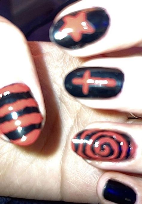 aesthetic decorated nails photo Black And Red Nails With Cross, Red And Black Striped Nails, Star Nails Red And Black, Spiral Star Nails, Red Spiral Nails, Red Nails With Cross, Scene Kid Nails, Short Emo Nails, Emo Acrylic Nails