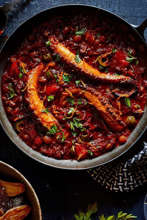 Braised Octopus in Tomato Sauce with Roasted Fingerling Potatoes | "This isn't your typical weeknight dinner, but the flavors in this recipe can absolutely make this a delicious comfort food." #dinnerideas #dinnerrecipes #dinnerdishes #familydinnerideas #supper #supperideas Cooking Octopus, Spanish Octopus, How To Cook Octopus, Octopus Recipes, Roasted Fingerling Potatoes, Paprika Sauce, Roasted Vegetable Recipes, Spicy Tomato Sauce, Fingerling Potatoes