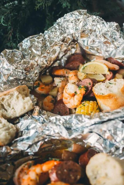 Shrimp Boil Foil Packets 🦐🌽 - Girl Carnivore Shrimp Boil Foil Packets, Shrimp Packets, Seafood Shack, Shrimp Boil Foil, Cajun Butter, Shrimp Boil, Foil Packets, Spicy Sausage, Cajun Seasoning